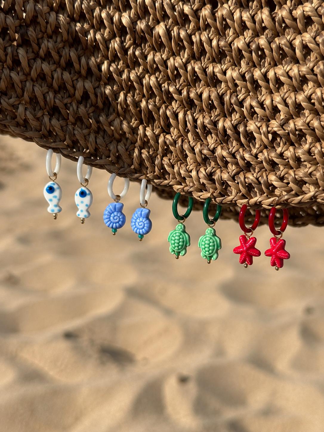 Boucles d'oreille Chador se balançant dans le vent